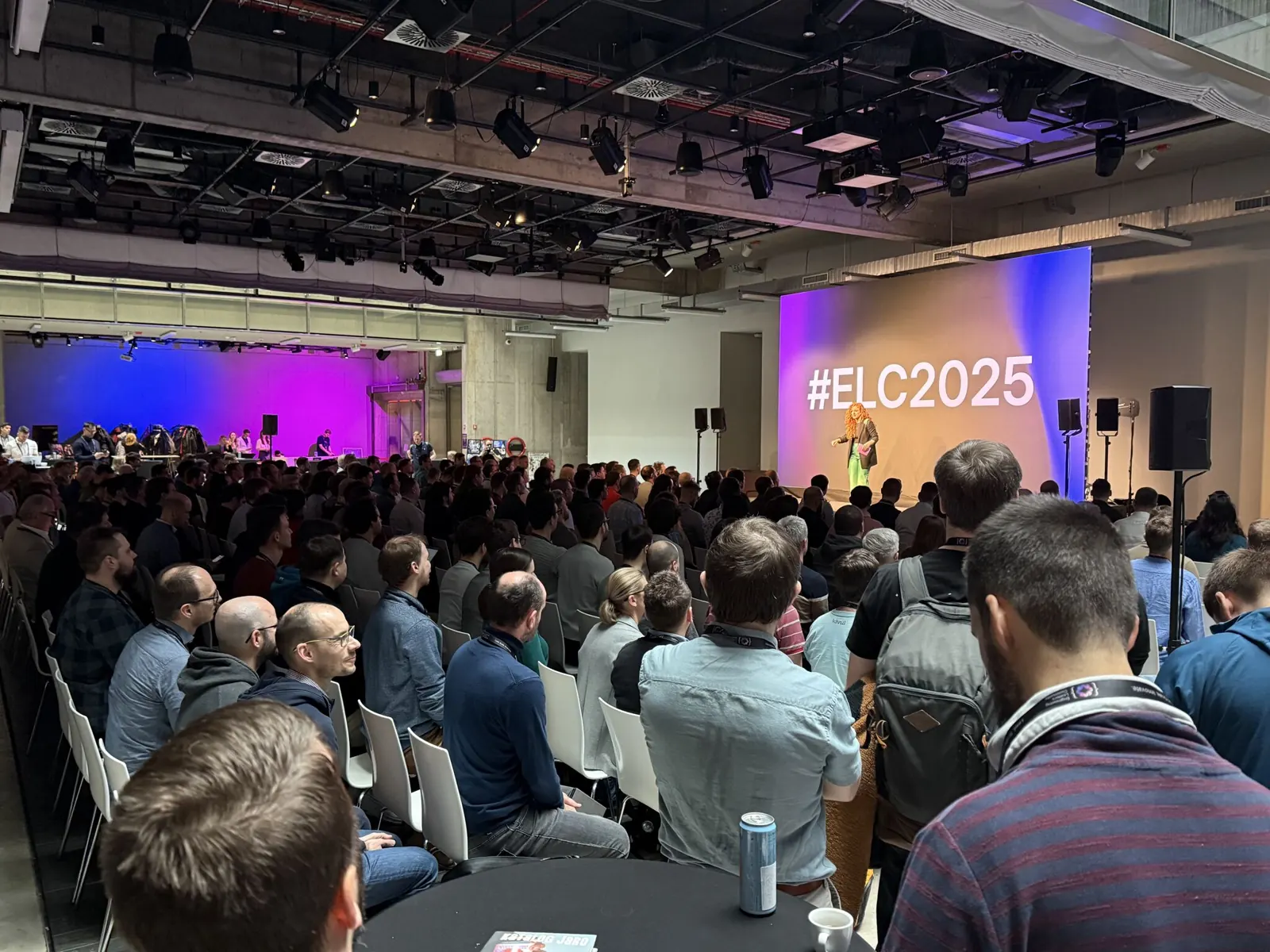 A packed ELC Conference hall watching a speaker on the main stage
